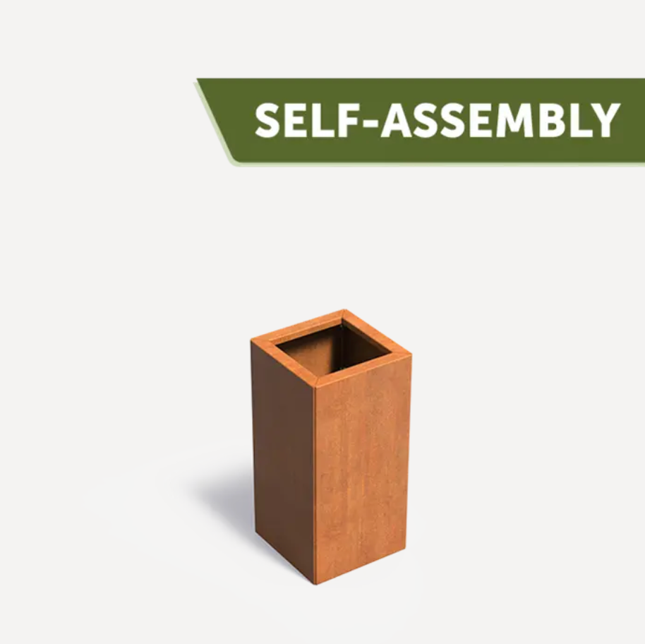 A brown, square-shaped self-assembly planter made of corten steel with a label stating 'SELF-ASSEMBLY' on the top right corner.