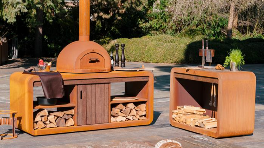 outdoor kitchen station in corten steel with wood storage