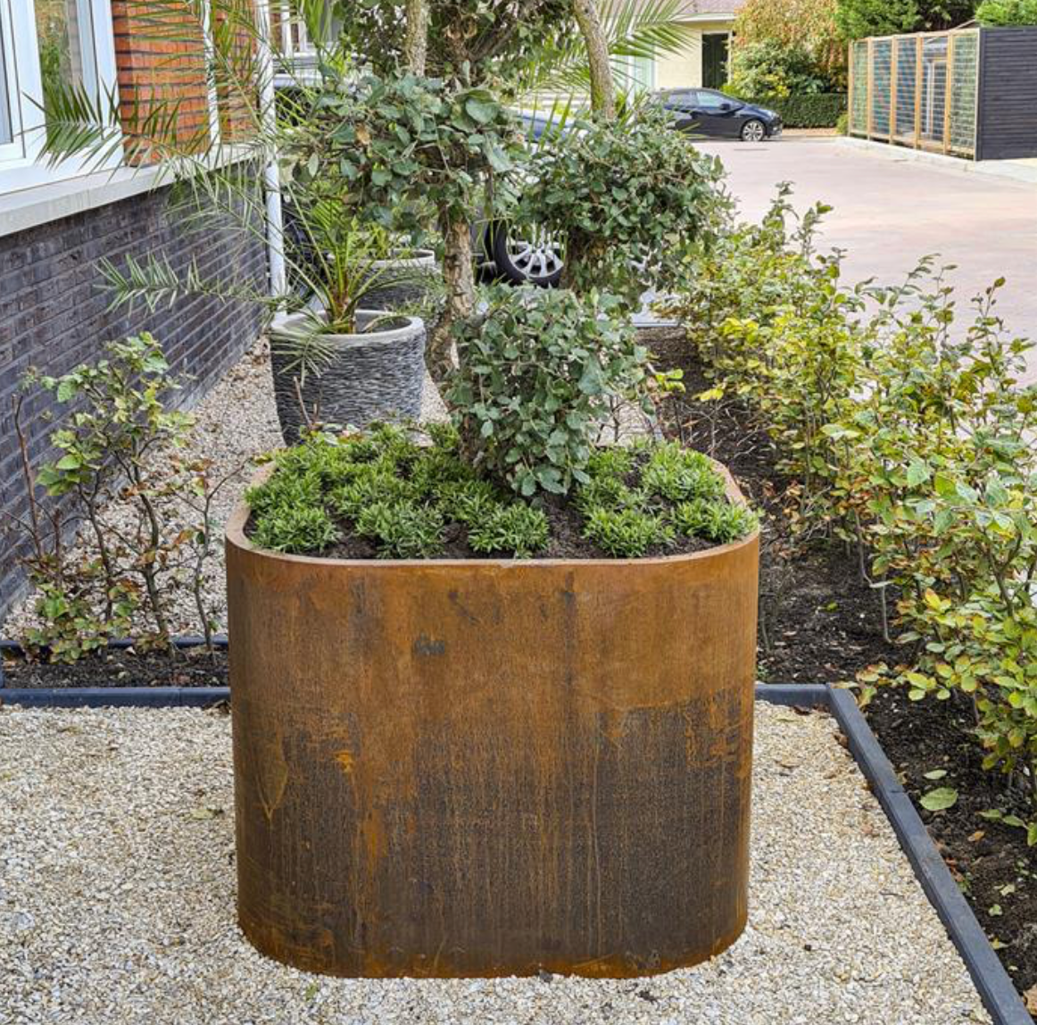 curved edge corten steel garden planter