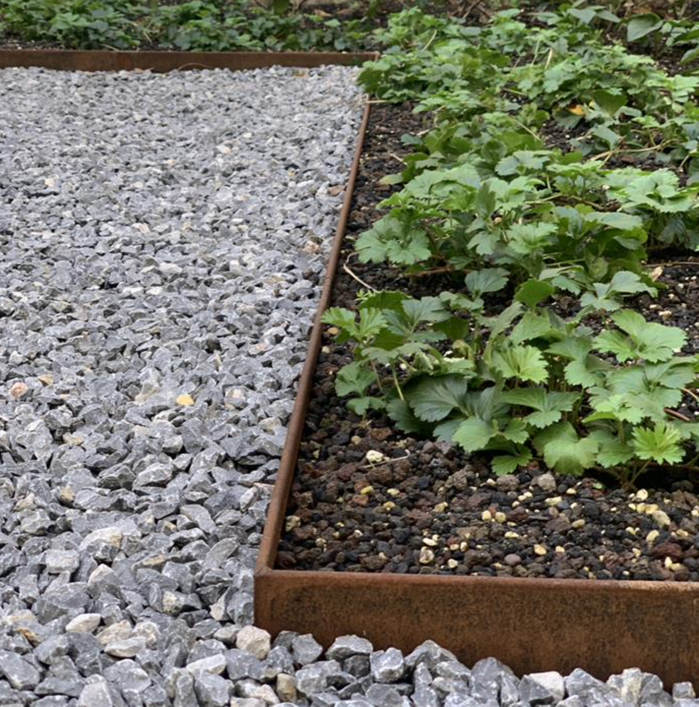 detail of corten steel corners for garden edging