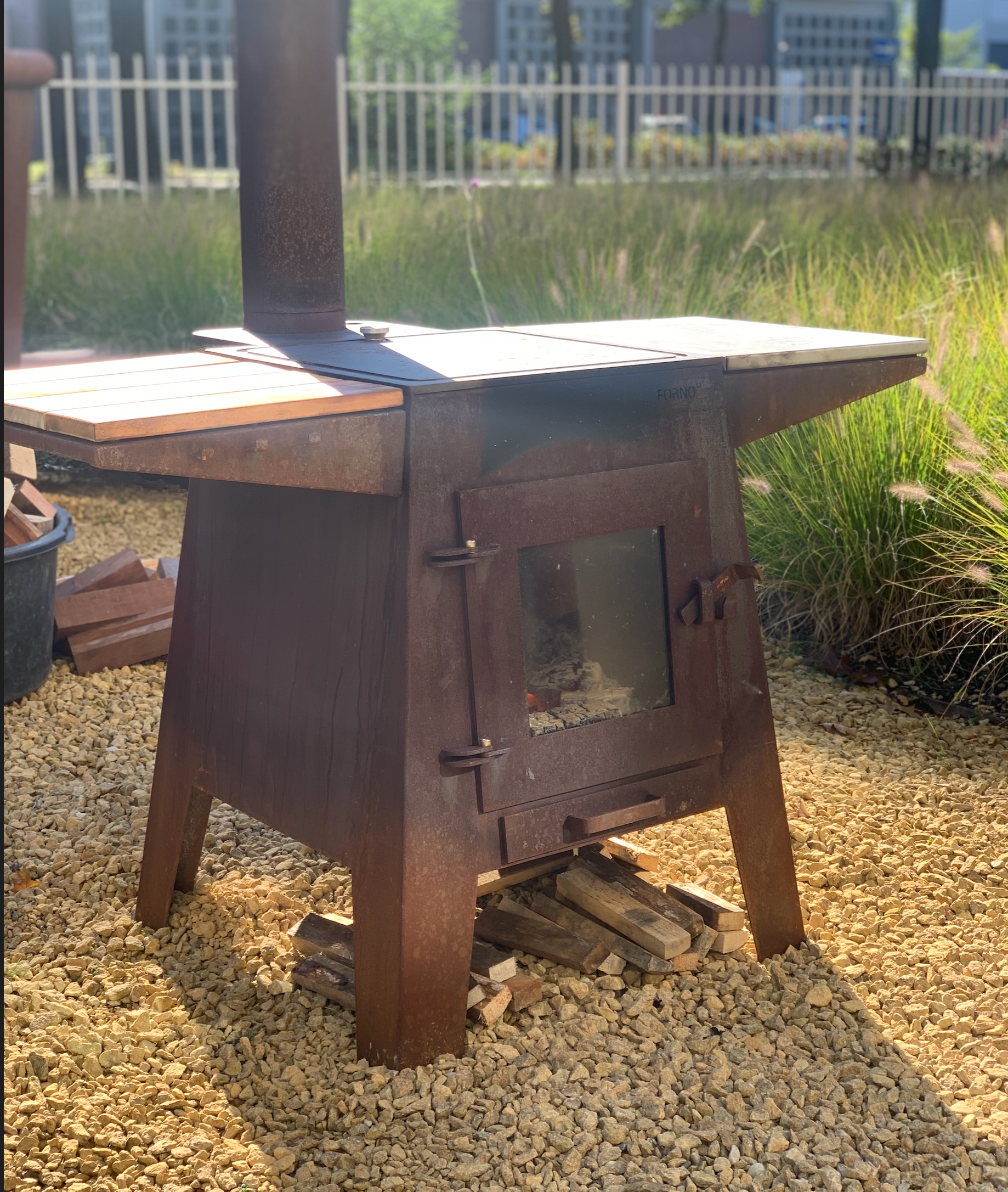 corten steel outdoor stove with chimney