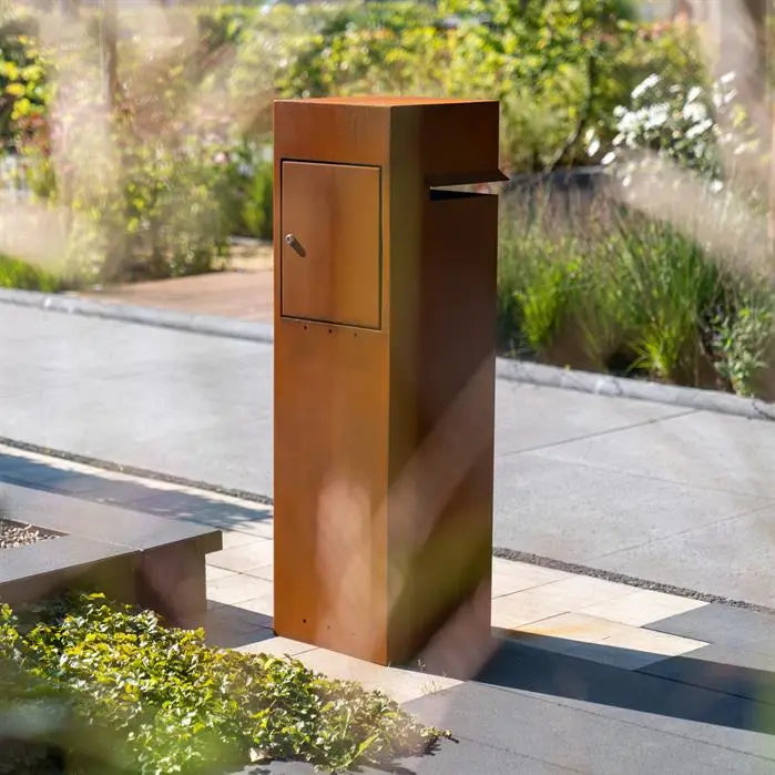 corten steel letterbox on pavememt