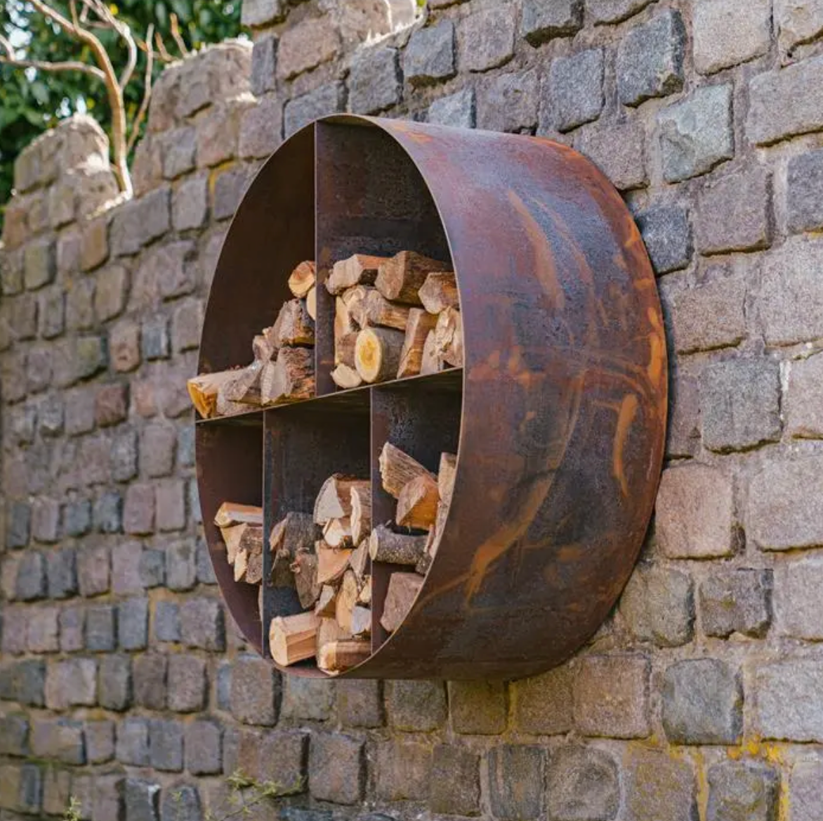 round corten wood store mounted on stone wall 
