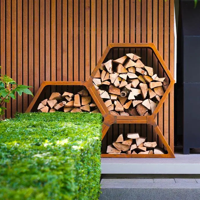 hexaganol corten wood store with wood inside