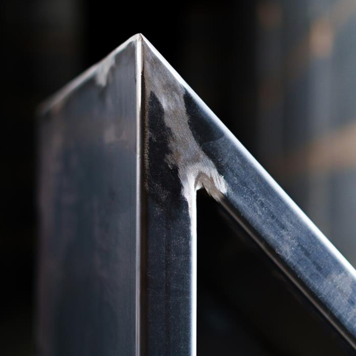 detail of corner of triangle metal planter