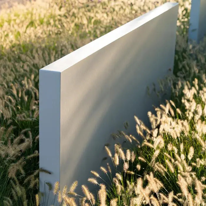 white fiberglass wall on grass