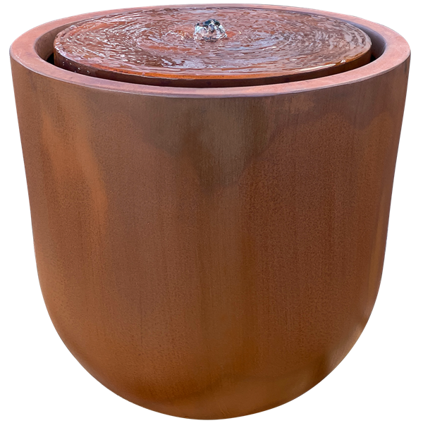 rust coloured round water table with central fountain