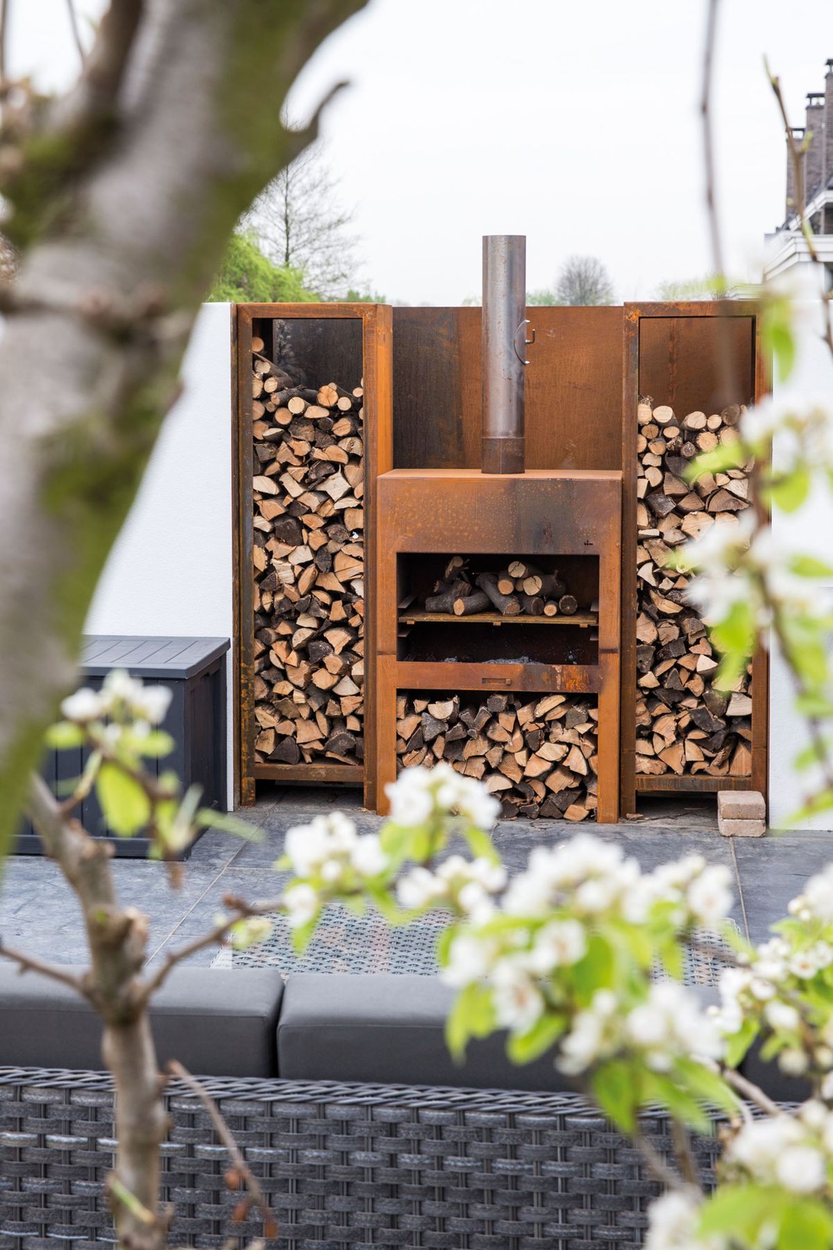 corten steel wood store surrounding corten steel outdoor stove