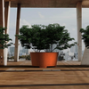 large round corten planter with feet planted with trees