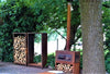 corten outdoor fireplace above and next to a corten wood store