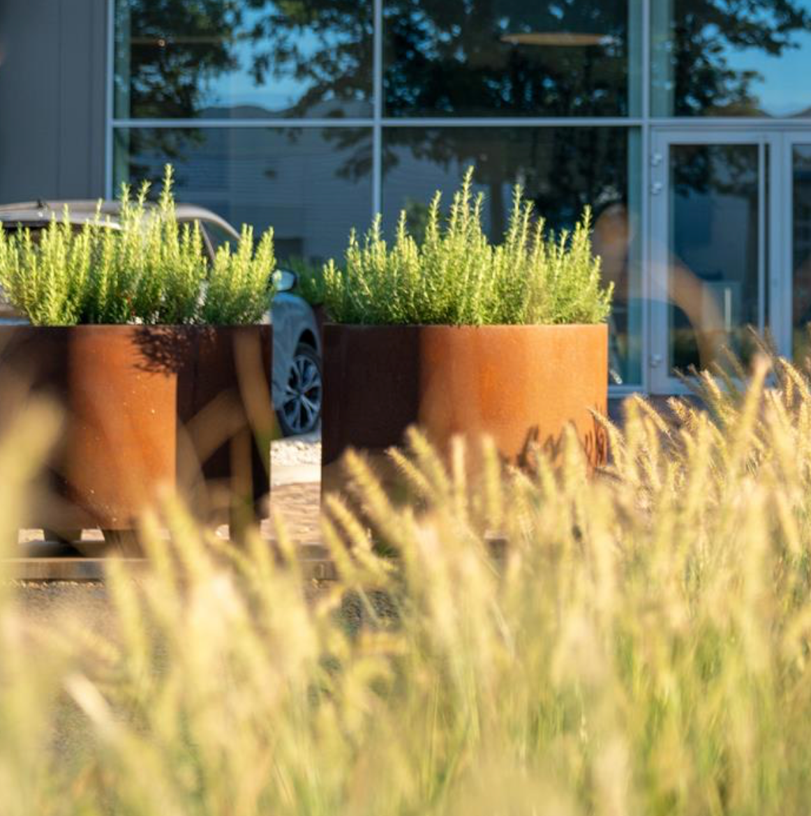 two circum corten steel garden pots