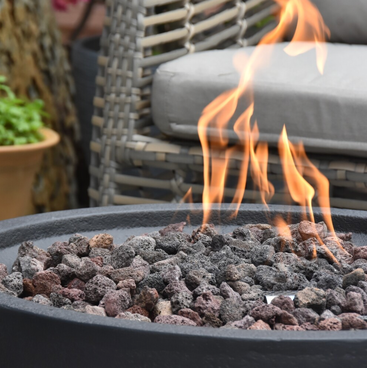 detail of burning round gas fire bowl