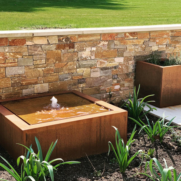 square corten water table filled with water