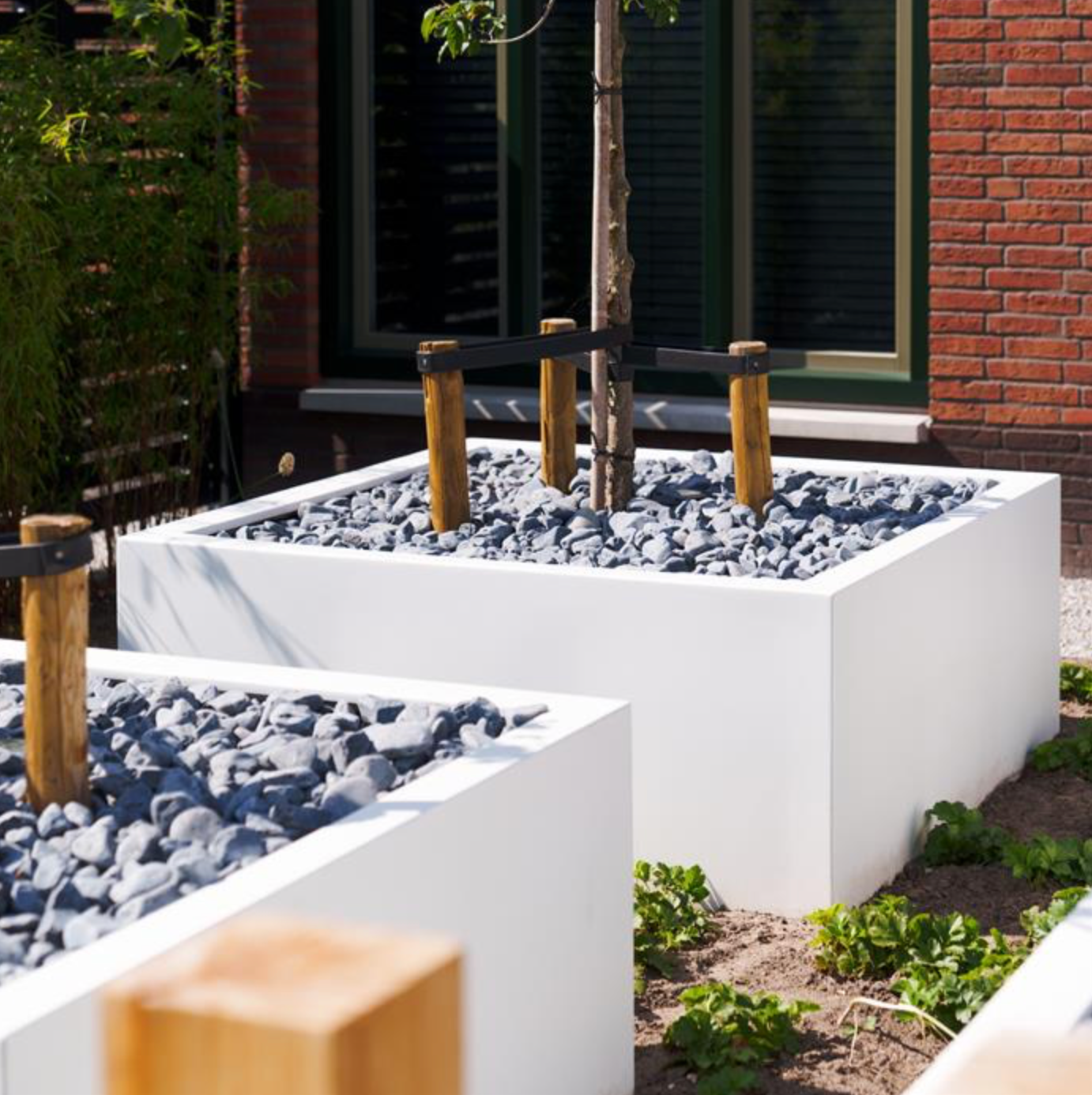 two square white fibergalss garden planters